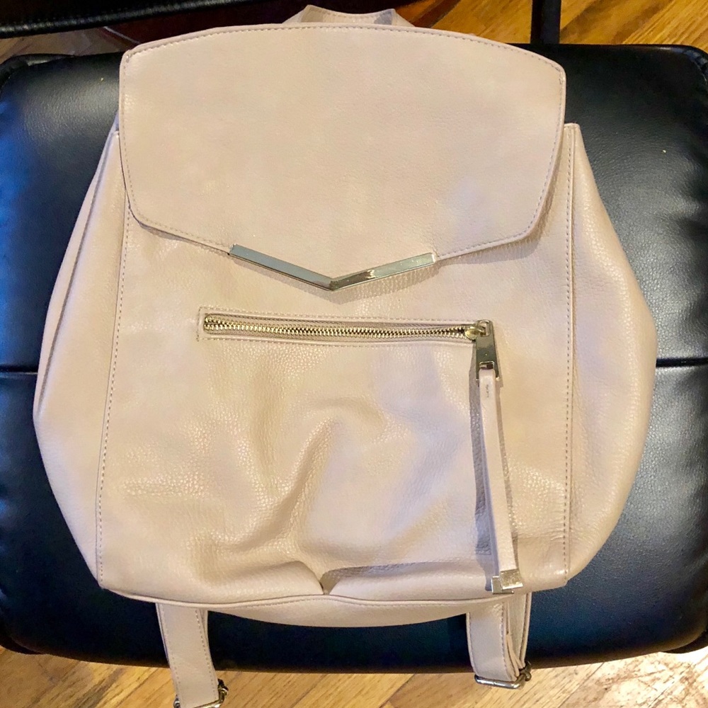 Faux leather back pack with gold hardware trim